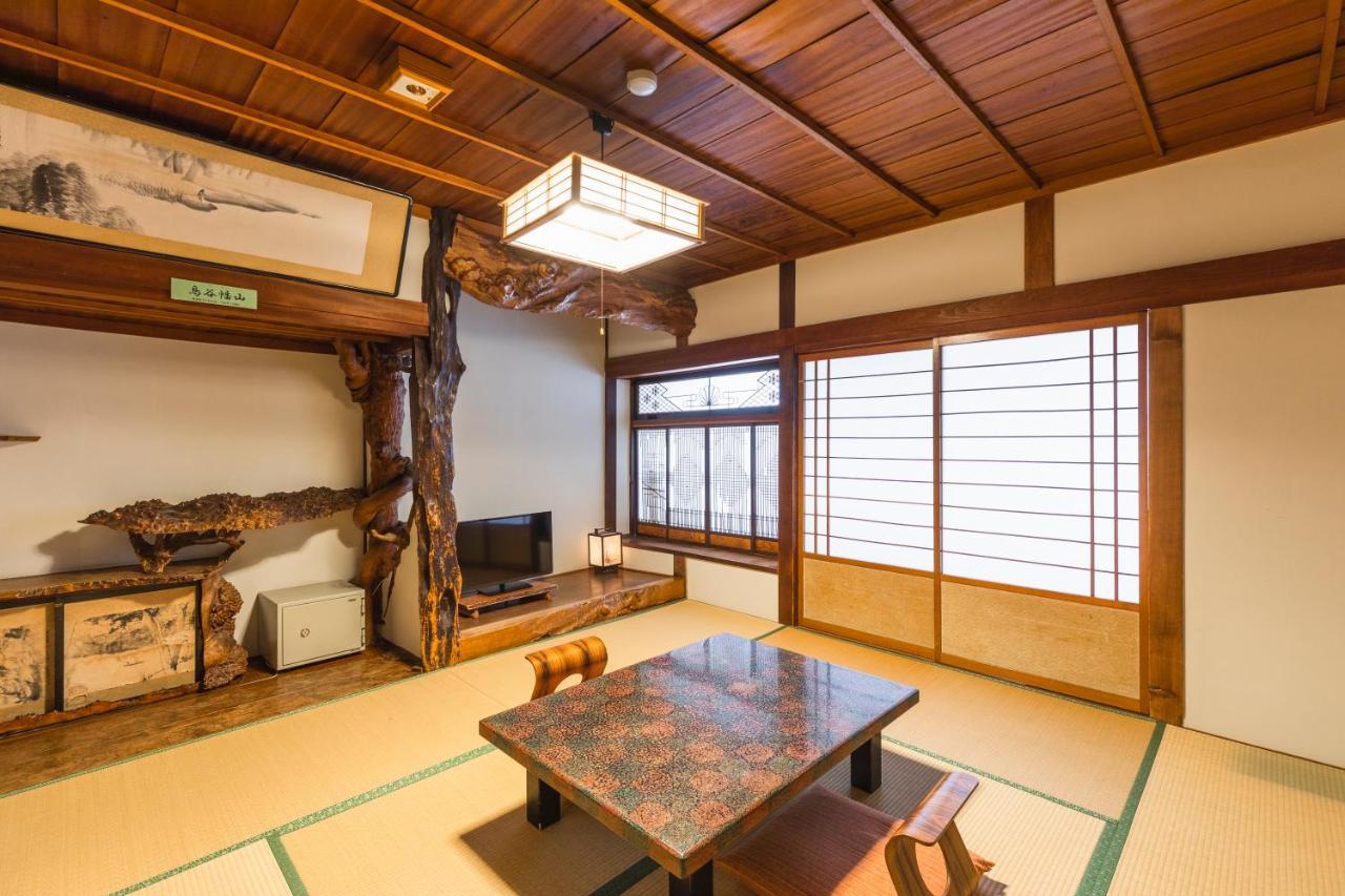 Tsuta Onsen Ryokan Товада Екстериор снимка